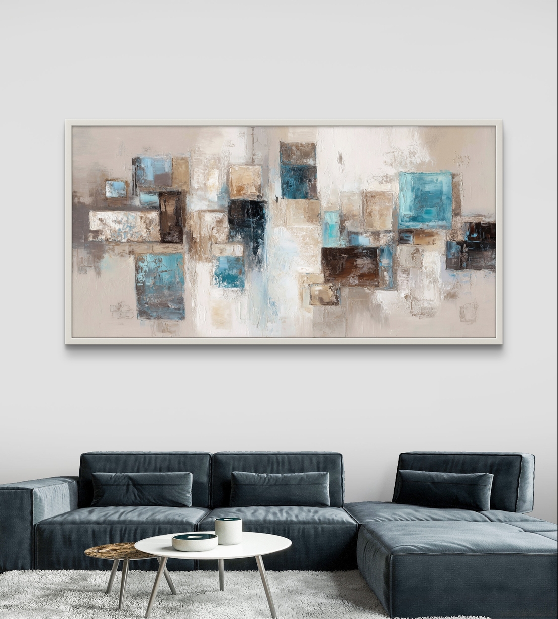 תמונת קנבס לרוחב בעיצוב אבסטרקטי עם צורות גאומטריות בגווני תכלת, בז’ ושמנת