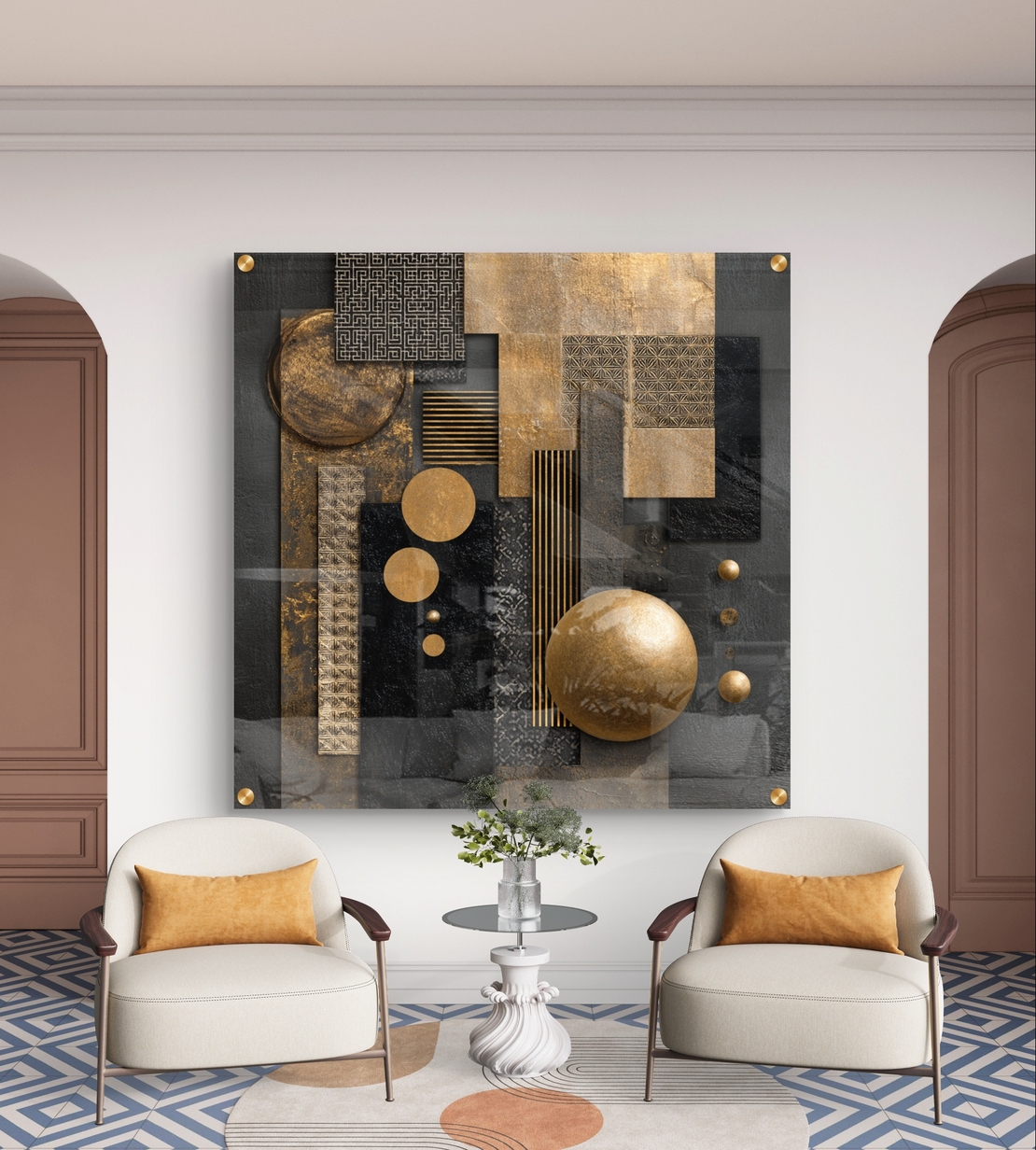 תמונת זכוכית מרובעת בעיצוב אבסטרקט גאומטרי בגווני שחור וזהב עם אלמנטים עגולים ומלבניים