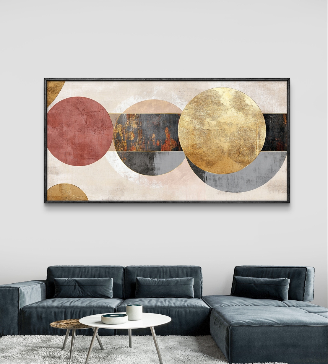 תמונת קנבס לרוחב בעיצוב אבסטרקטי עם מעגלים חופפים בגווני שמנת, זהב ואפור על רקע בהיר.