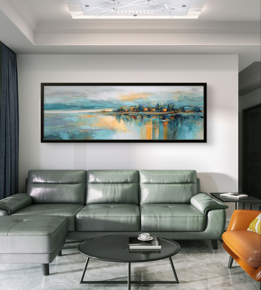 תמונת קנבס פנורמית אבסטרקטית עם קו אופק, השתקפות מים וגווני כחול, תכלת וזהב בעיצוב רגוע ויוקרתי
