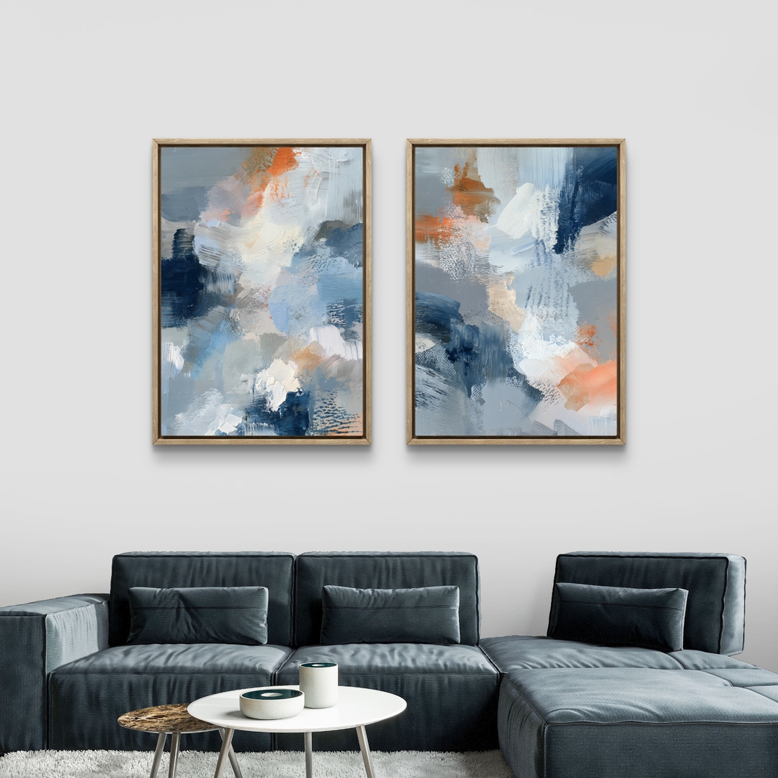 סט תמונות קנבס זוגי בגווני כחול, אפור וכתום בעיצוב אבסטרקטי רך – תכשיט לבית