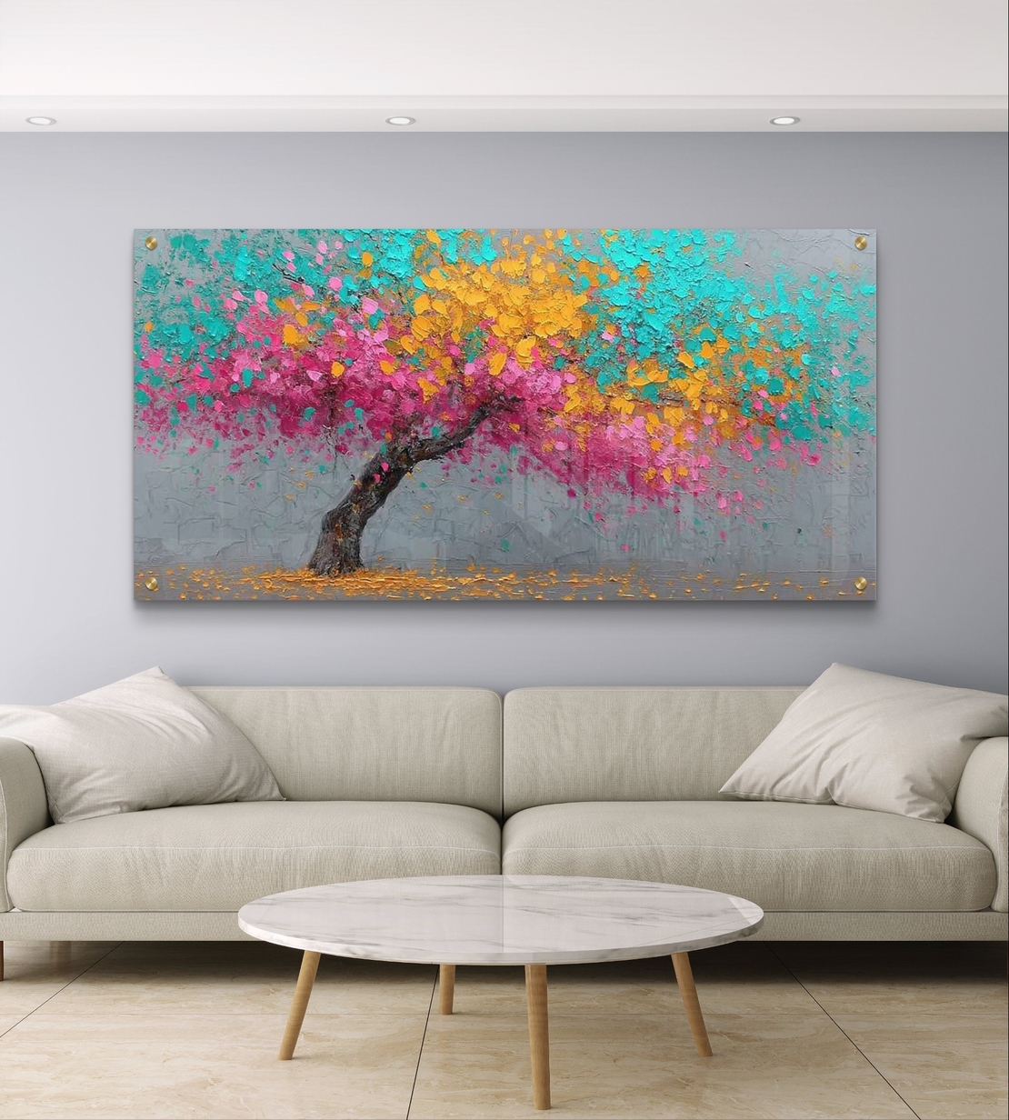 תמונת זכוכית לרוחב עם עץ צבעוני בגווני ורוד טורקיז וצהוב בעיצוב מודרני לסלון