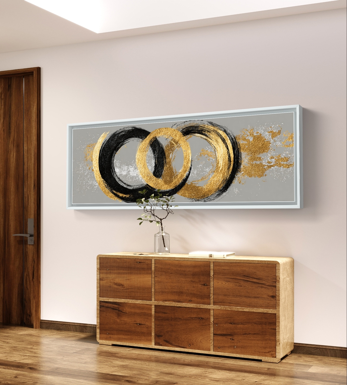 תמונת קנבס פנורמית אבסטרקטית עם מעגלים בגווני שחור וזהב על רקע אפור בעיצוב מודרני ויוקרתי