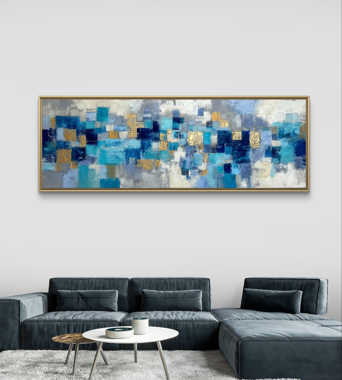תמונת קנבס פנורמית מופשטת בגווני כחול וטורקיז עם נגיעות זהב – תכשיט לבית