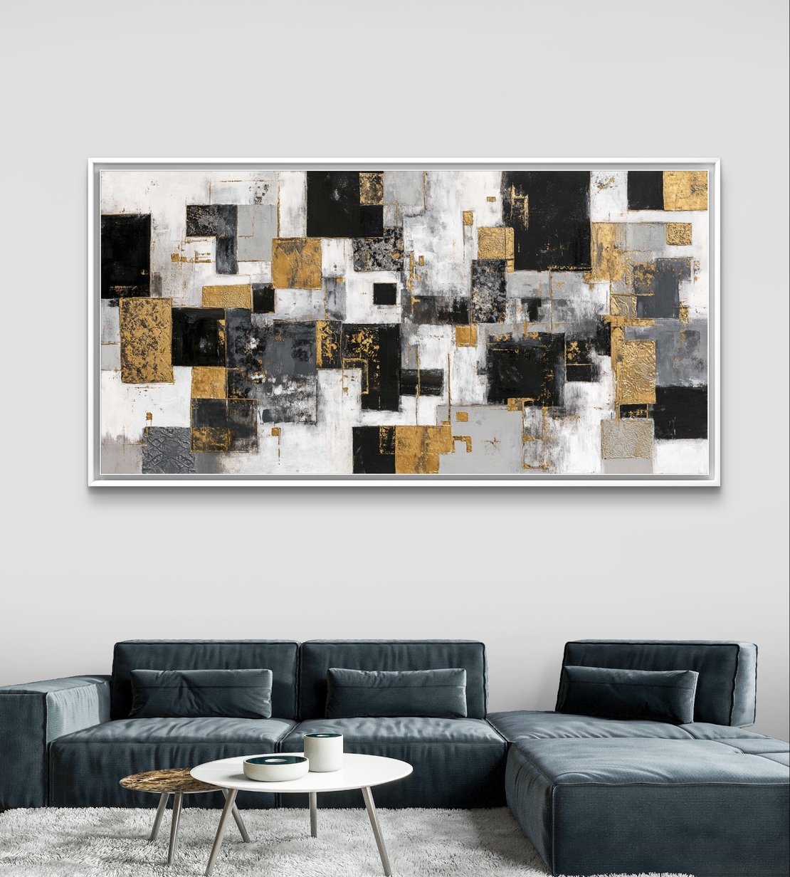 תמונת קנבס אבסטרקטית עם בלוקים גיאומטריים בגווני שחור, לבן, אפור וזהב