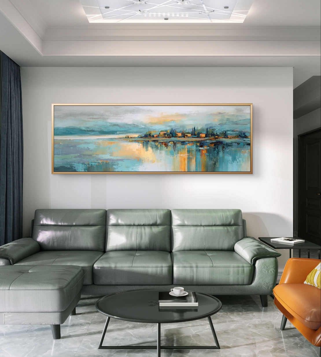 תמונת קנבס פנורמית אבסטרקטית עם קו אופק, השתקפות מים וגווני כחול, תכלת וזהב בעיצוב רגוע ויוקרתי