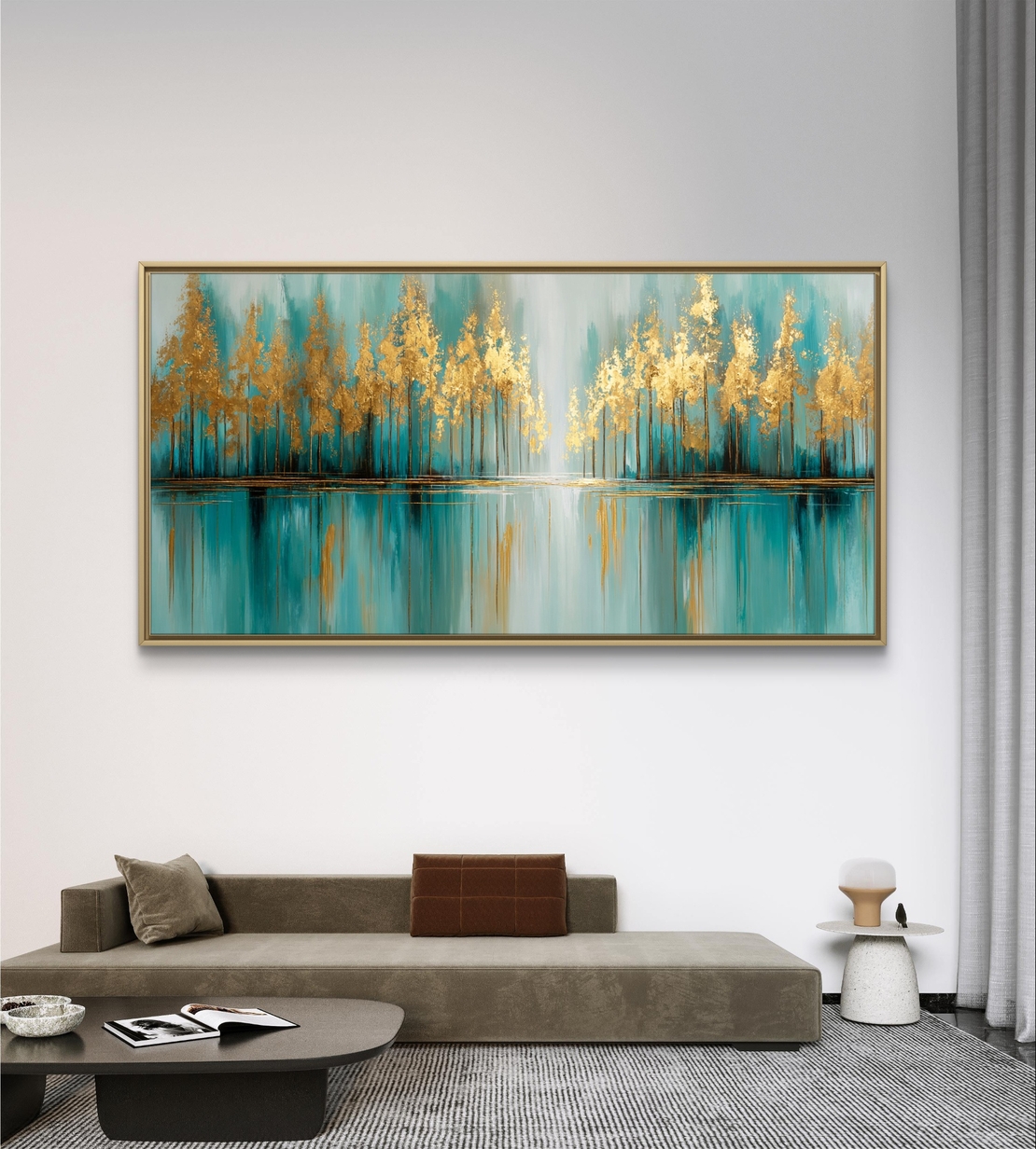 תמונת קנבס לרוחב עם עצים מופשטים בגווני טורקיז ונגיעות זהב המשתקפים במים, בהדפסה חלקה לעיצוב מודרני ויוקרתי.