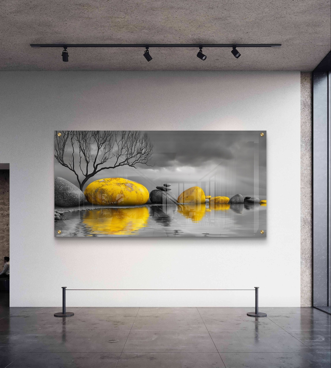 תמונת זכוכית רוחבית של אבנים מוזהבות מעל מים עם רקע אפור דרמטי – תכשיט לבית