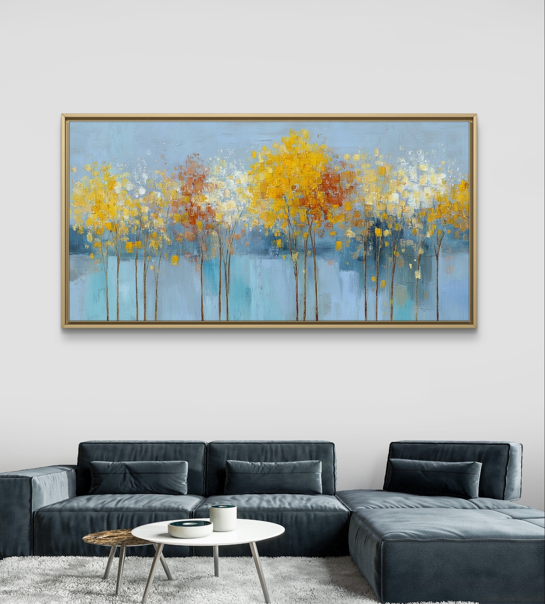 תמונת קנבס של עצים עדינים בגווני תכלת, צהוב ולבן על רקע בהיר