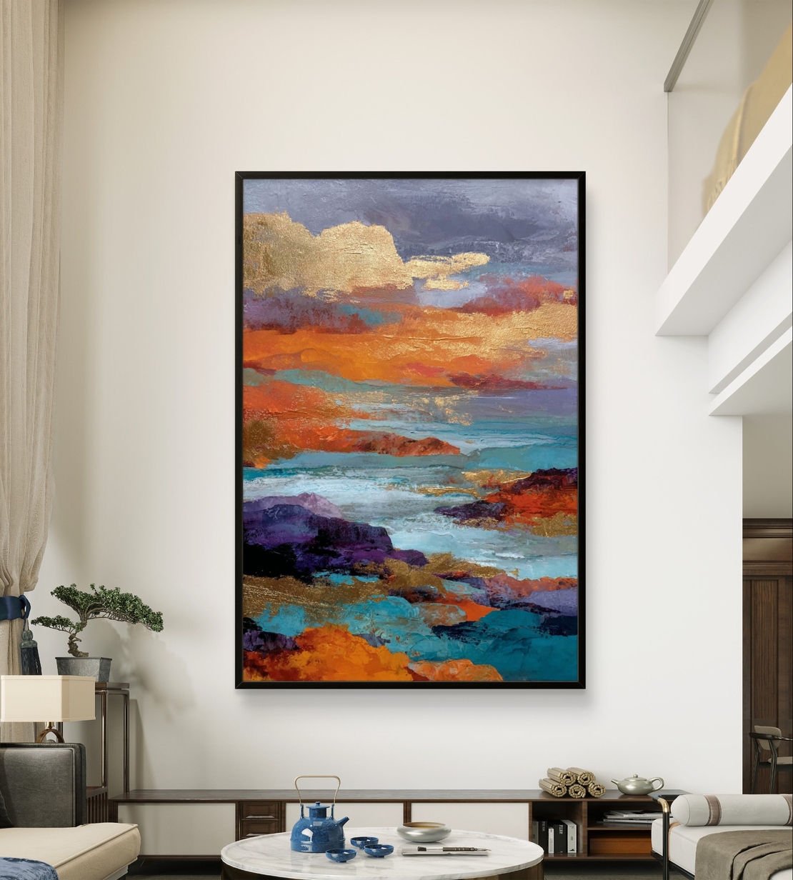 תמונת קנבס אבסטרקטית עם נגיעות זהב וגווני כחול וכתום, בהשראת ים ושקיעה בעיצוב מודרני