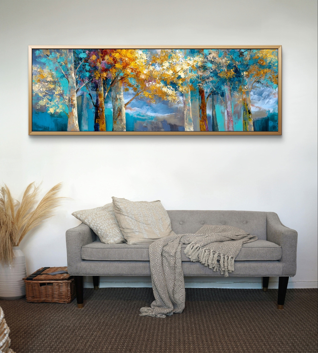 קנבס רחב לסלון המציג שדרת עצים אמנותית בגוונים חיים.