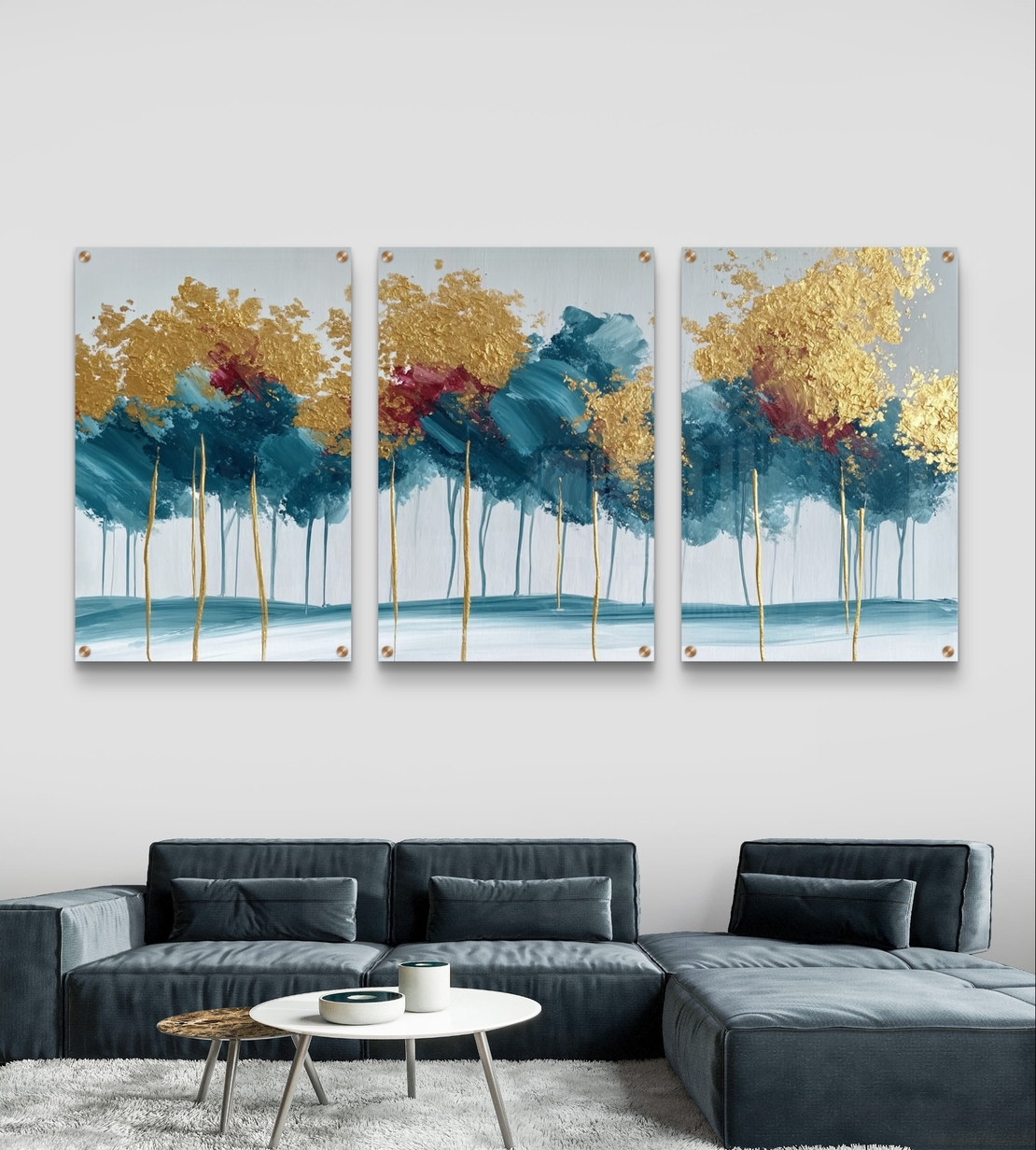 שלישיית תמונות זכוכית עם עצים אבסטרקטיים בגווני טורקיז וזהב בעיצוב יוקרתי ומודרני