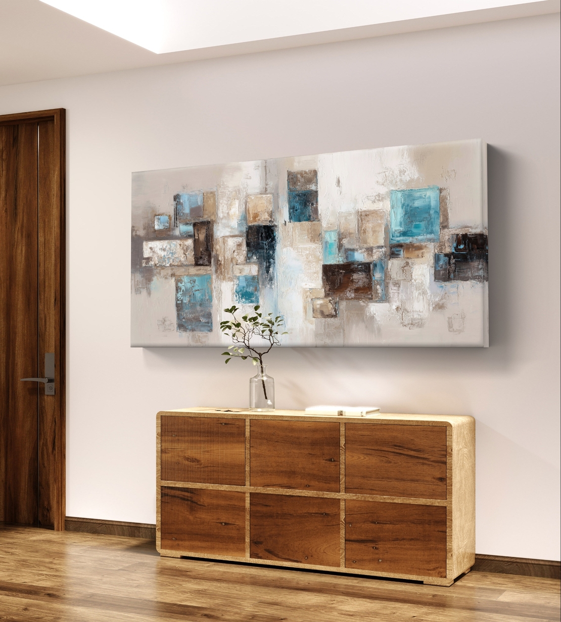 תמונת קנבס לרוחב בעיצוב אבסטרקטי עם צורות גאומטריות בגווני תכלת, בז’ ושמנת