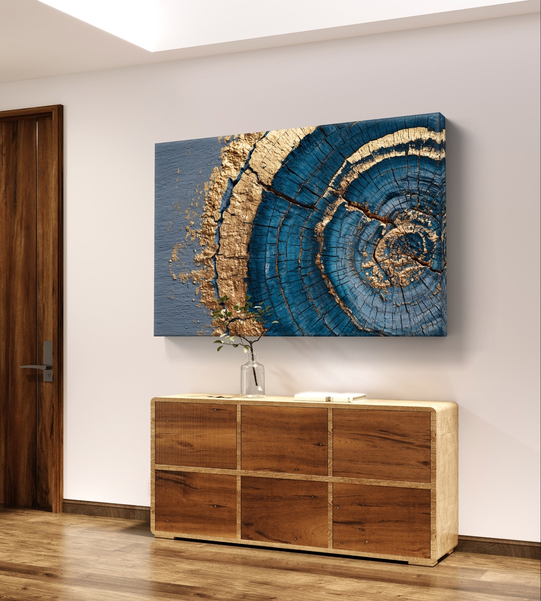 תמונת קנבס אבסטרקטית עם מעגלים בגווני כחול וזהב בהשראת חתך עץ