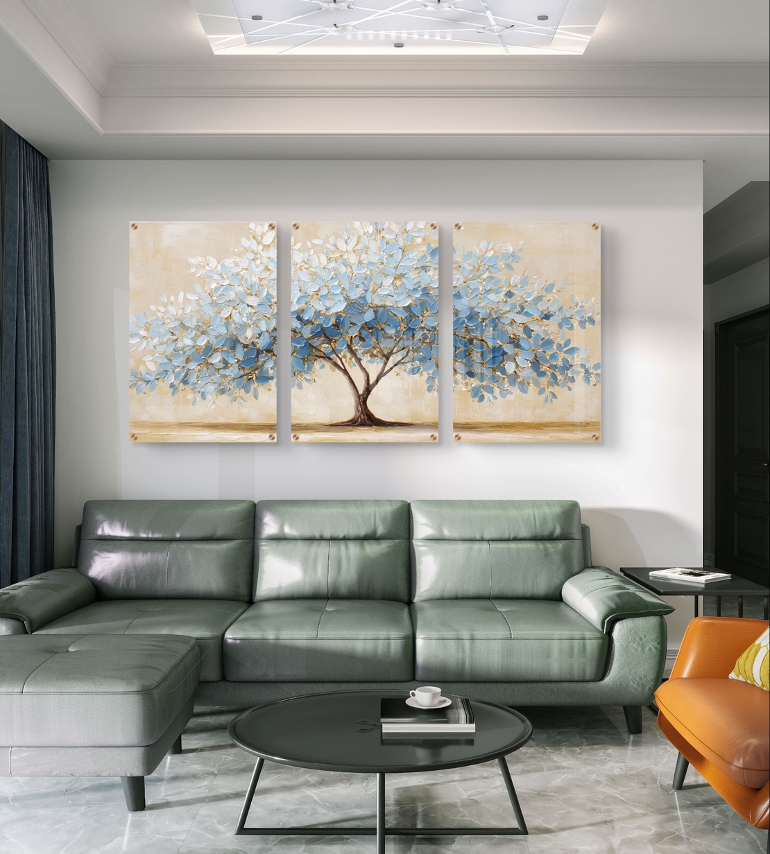 סט שלישייה של תמונות זכוכית עם עץ אבסטרקטי רחב בגווני תכלת, שמנת וזהב בעיצוב מודרני ורגוע
