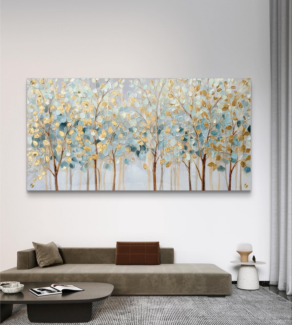 תמונת זכוכית לרוחב עם שדרת עצים בגווני תכלת וזהב בעיצוב יוקרתי ורגוע