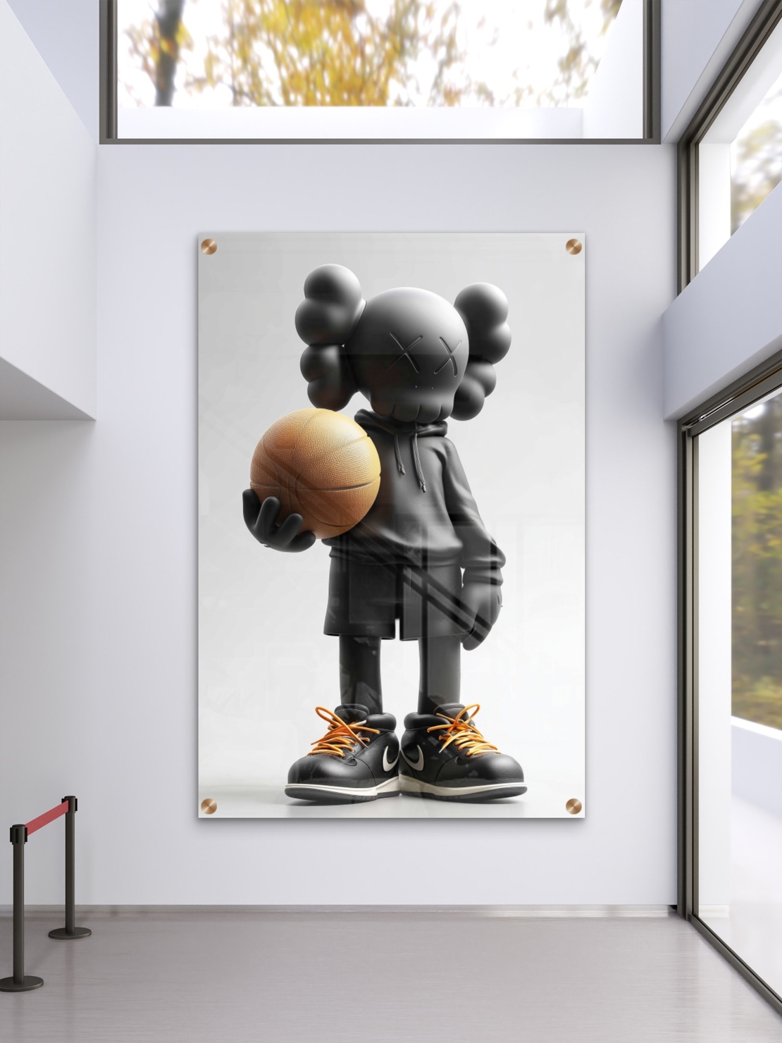 תמונת זכוכית של דמות KAWS שחורה מחזיקה כדורסל, עם נעליים שחורות ושרוכים כתומים – מתוך קולקציית NEXTGEN BY BAR של תכשיט לבית.