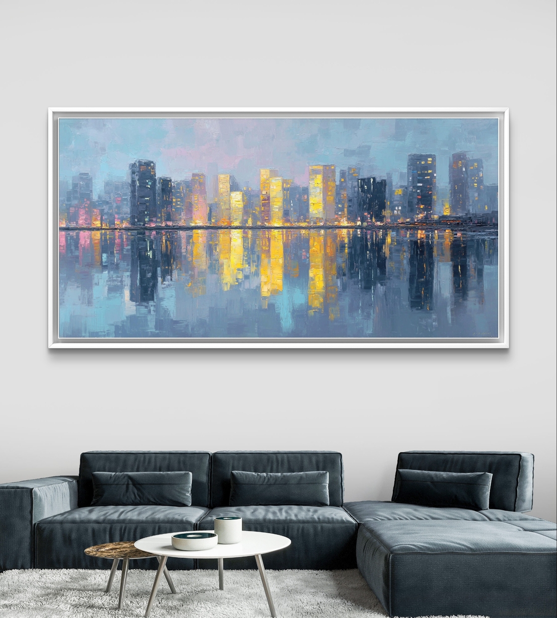 תמונת קנבס של קו רקיע עירוני בגווני כחול וזהב עם השתקפות במים