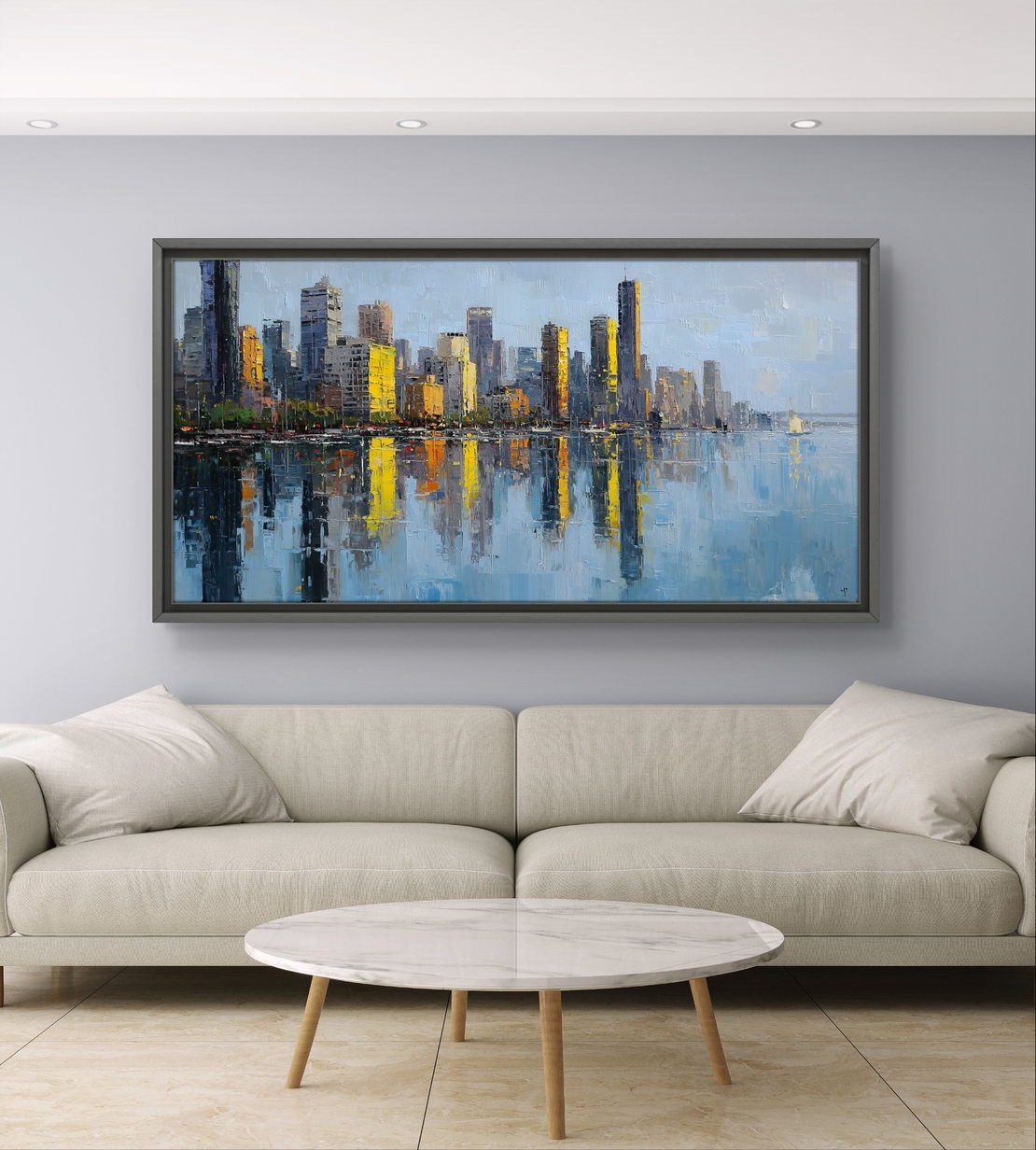 תמונת קנבס לרוחב של קו רקיע עירוני עם השתקפות במים בגווני כחול וזהב, לעיצוב סלון מודרני ואלגנטי