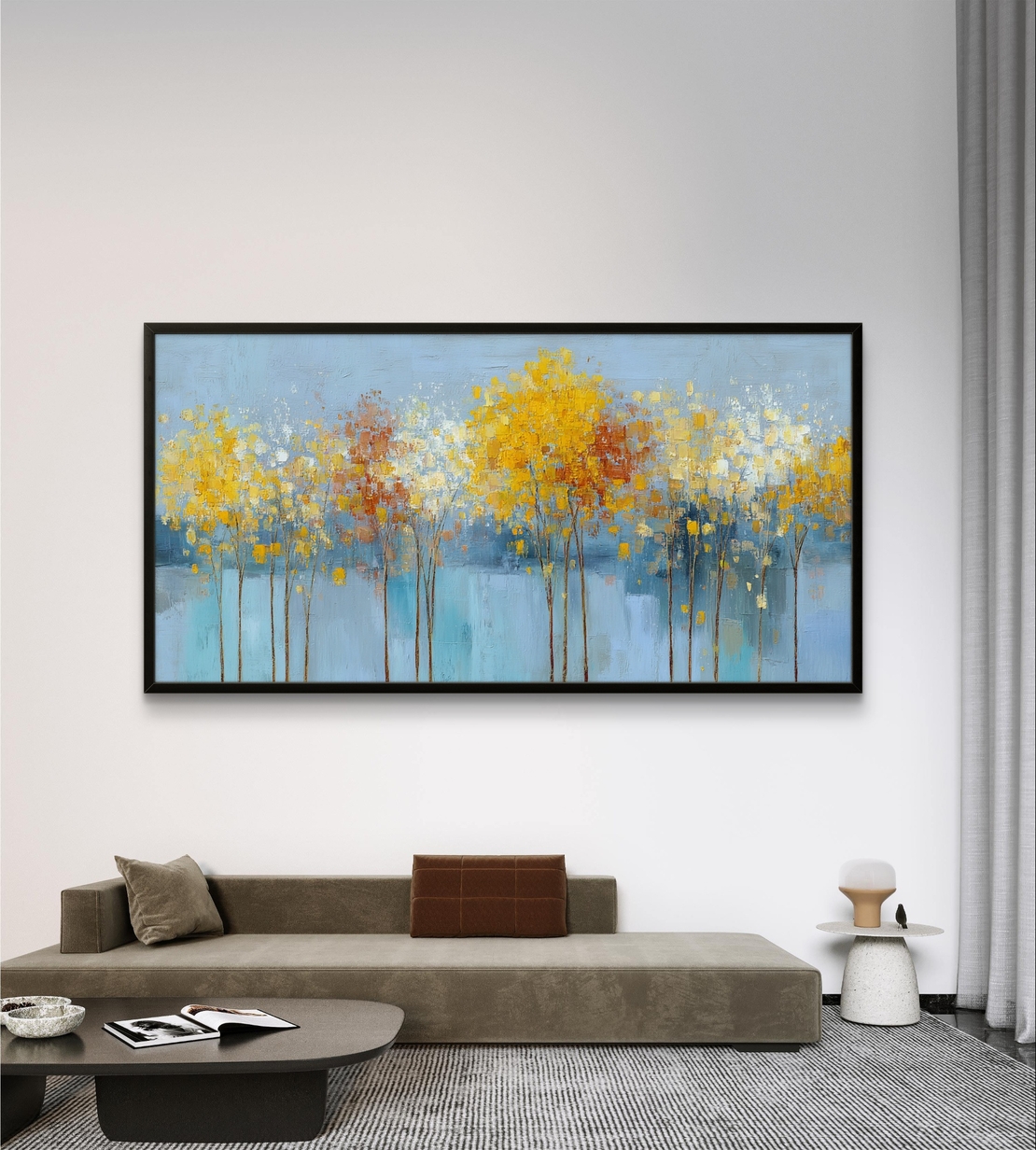 תמונת קיר רגועה לסלון עם עצים דקים ואווירה אוורירית בצבעי תכלת וזהב