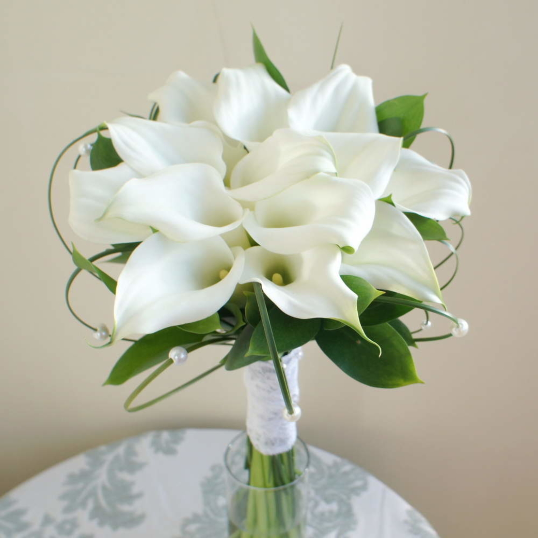 A bridal bouquet with callas