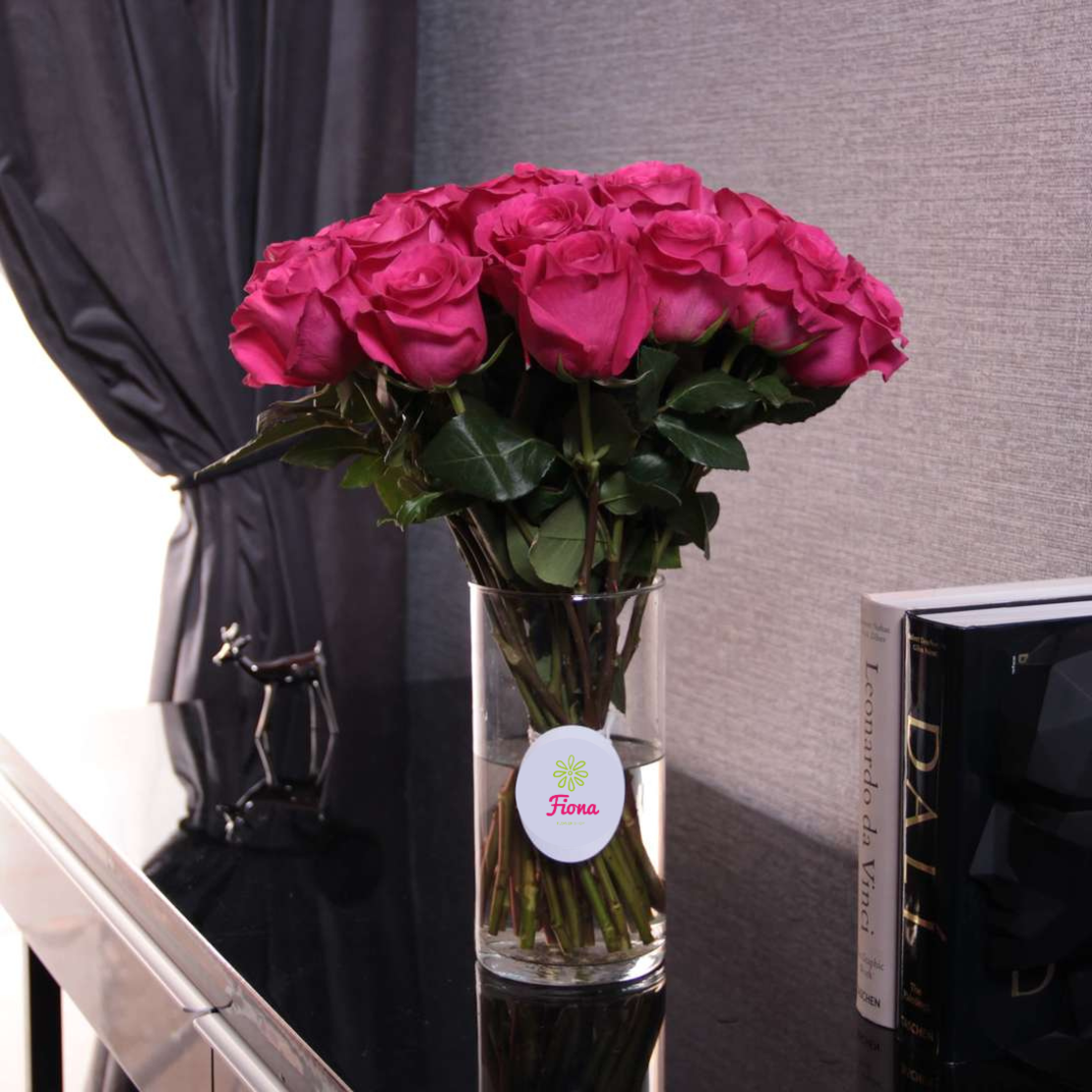Dark pink roses in a vase