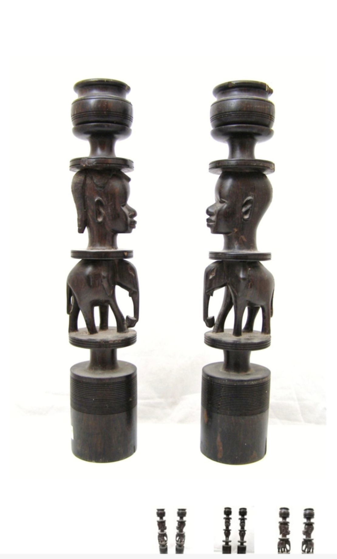 זוג פמוטי עץ אבוני מעוטרים ראשים ופילים, צ'יפים, גובה 39 ס